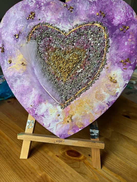 Loving heart. Acrylic Painting. Canvas. Combination of purple, gold and white colors. Decorative glass, stones and feather.