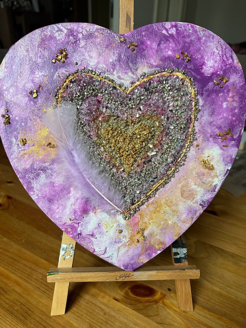 Loving heart. Acrylic Painting. Canvas. Combination of purple, gold and white colors. Decorative glass, stones and feather.